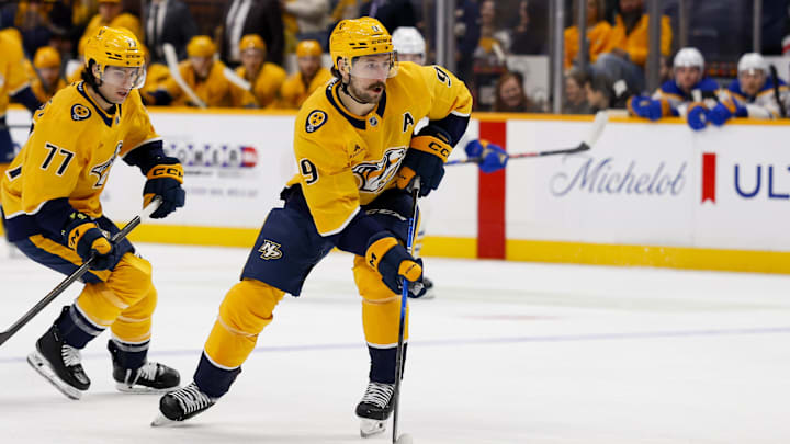 Jan 20, 2026; Nashville, Tennessee, USA;  Nashville Predators left wing Filip Forsberg (9) skates with the puck against the Buffalo Sabres during the first period at Bridgestone Arena. Mandatory Credit: Steve Roberts-Imagn Images