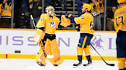 Nov 9, 2024; Nashville, Tennessee, USA;  Nashville Predators defenseman Roman Josi (59) congratulates goaltender Juuse Saros (74) on the win against the Utah Hockey Club during the third period at Bridgestone Arena. Mandatory Credit: Steve Roberts-Imagn Images