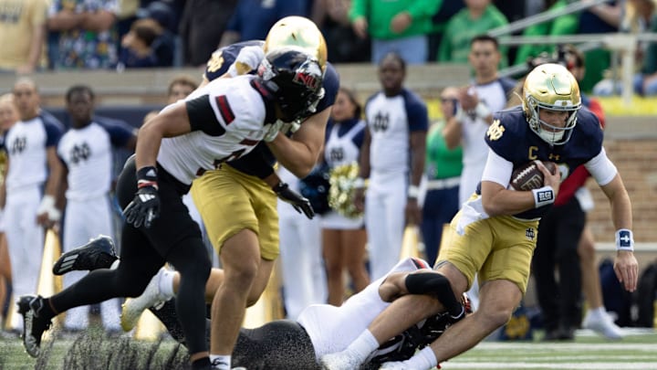 Northern Illinois safety Santana Banner tackles Notre Dame quarterback Riley Leonard during a NCAA college football game between Notre Dame and Northern Illinois at Notre Dame Stadium on Saturday, Sept. 7, 2024, in South Bend.