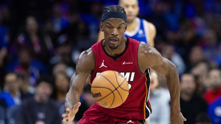 Apr 17, 2024; Philadelphia, Pennsylvania, USA; Miami Heat forward Jimmy Butler (22) picks up a loose ball against the Philadelphia 76ers during the second quarter of a play-in game of the 2024 NBA playoffs at Wells Fargo Center. Mandatory Credit: Bill Streicher-USA TODAY Sports