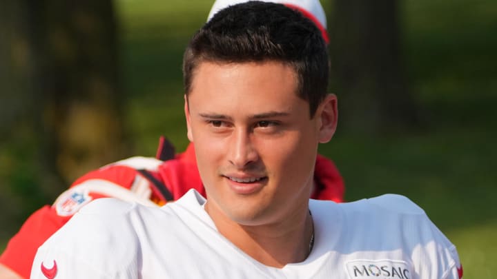 Jul 26, 2024; Kansas City, MO, USA; Kansas City Chiefs punter Matt Araiza (49) walks from the locker room to the fields prior to training camp at Missouri Western State University. Mandatory Credit: Denny Medley-USA TODAY Sports