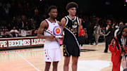 Apr 1, 2025; Brooklyn, NY, USA; McDonald's All American West guard Darryn Peterson (22) and McDonald's All American East forward Cameron Boozer (12) pose for photos after the game at Barclays Center. Mandatory Credit: Pamela Smith-Imagn Images
