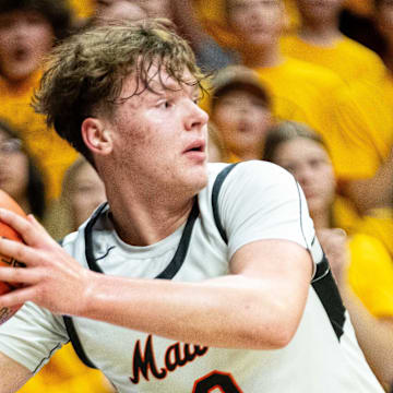 Madrid's Jevyn Severson (0) keeps the ball inbounds during the boys Class 1A state quarterfinal against Boyden Hull on Wednesday, March 12, 2025, at Wells Fargo Arena in Des Moines.