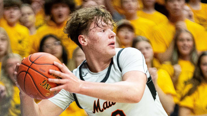 Madrid's Jevyn Severson (0) keeps the ball inbounds during the boys Class 1A state quarterfinal against Boyden Hull on Wednesday, March 12, 2025, at Wells Fargo Arena in Des Moines. Madrid's Jevyn Severson (0) keeps the ball inbounds during the boys Class 1A state quarterfinal against Boyden Hull on Wednesday, March 12, 2025, at Wells Fargo Arena in Des Moines.
