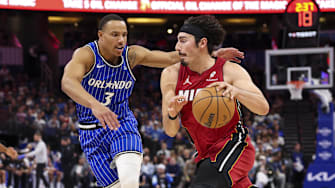 Dec 5, 2025; Orlando, Florida, USA; Miami Heat forward Jaime Jaquez Jr. (11) drives to the basket past Orlando Magic guard Desmond Bane (3) in the first quarter at Kia Center. Mandatory Credit: Nathan Ray Seebeck-Imagn Images