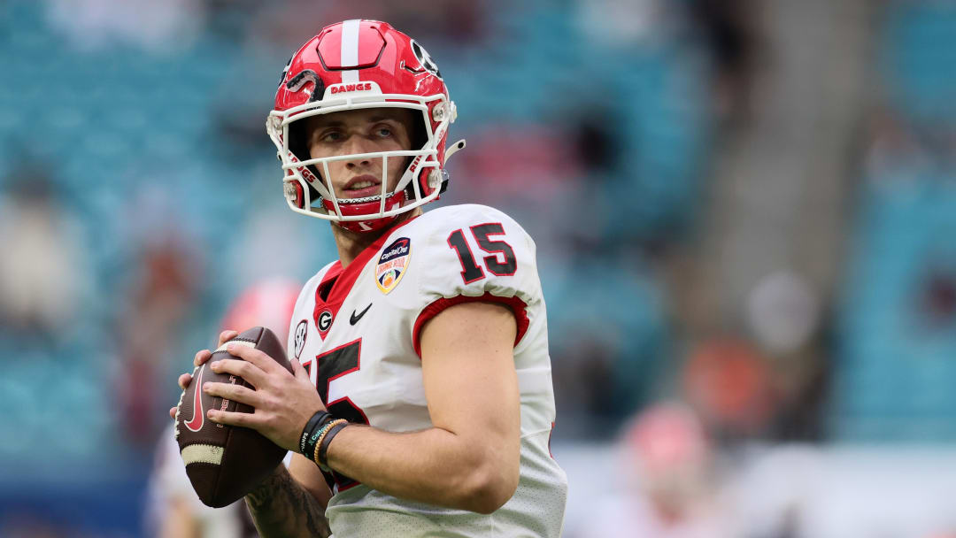 Dec 30, 2023; Miami Gardens, FL, USA; Georgia Bulldogs quarterback Carson Beck (15) practices before the game against the Florida State Seminoles for the 2023 Orange Bowl at Hard Rock Stadium. Mandatory Credit: Sam Navarro-USA TODAY Sports