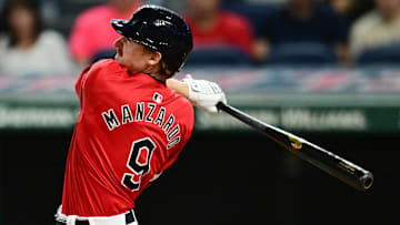 Sep 16, 2024; Cleveland, Ohio, USA; Cleveland Guardians designated hitter Kyle Manzardo (9) hits a two-run home run during the eighth inning against the Minnesota Twins at Progressive Field. Mandatory Credit: Ken Blaze-Imagn Images