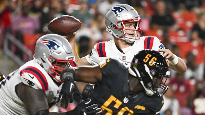 Aug 25, 2024; Landover, Maryland, USA;  New England Patriots quarterback Drake Maye (10) throws fro the pocket during the first half against the Washington Commanders at Commanders Field. Mandatory Credit: Tommy Gilligan-USA TODAY Sports
