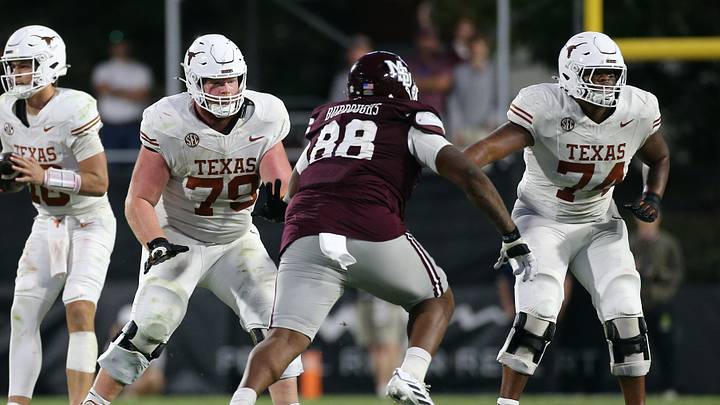 Oct 25, 2025; Starkville, Mississippi, USA; Texas Longhorns offensive linemen Connor Stroh (79) and Trevor Goosby (74) block Mississippi State Bulldogs defensive linemen Jamil Burroughs (88) during the fourth quarter at Davis Wade Stadium at Scott Field. Mandatory Credit: Petre Thomas-Imagn Images