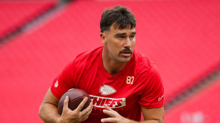 Aug 22, 2024; Kansas City, Missouri, USA; Kansas City Chiefs tight end Travis Kelce (87) warms up prior to a game against the Chicago Bears at GEHA Field at Arrowhead Stadium. Mandatory Credit: Jay Biggerstaff-USA TODAY Sports