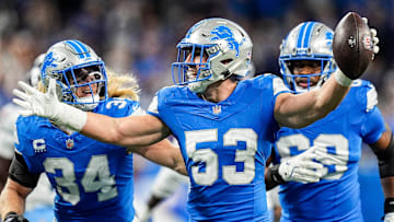 Detroit Lions linebacker Trevor Nowaske (53), center, celebrates an interception against Tennessee Titans during the first half at Ford Field in Detroit on Sunday, Oct. 27, 2024.