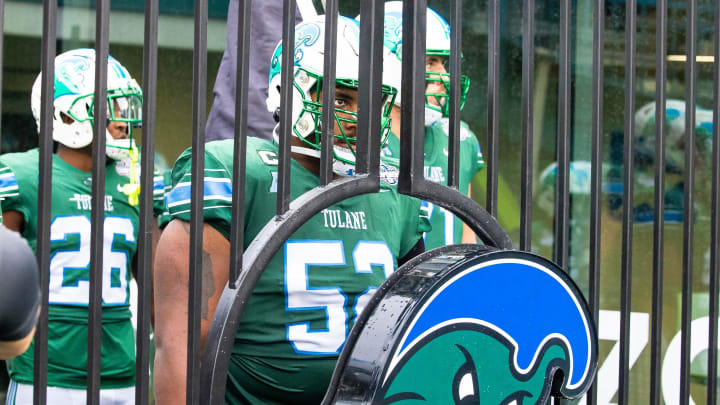 Dec 2, 2023; New Orleans, LA, USA; Tulane Green Wave offensive lineman Sincere Haynesworth (52) stands at the gate for player runouts against the Southern Methodist Mustangs during the first half at Yulman Stadium. Mandatory Credit: Stephen Lew-USA TODAY Sports