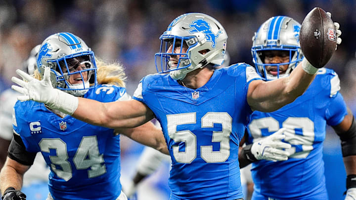 Detroit Lions linebacker Trevor Nowaske (53), center, celebrates an interception against Tennessee Titans during the first half at Ford Field in Detroit on Sunday, Oct. 27, 2024. Detroit Lions linebacker Trevor Nowaske (53), center, celebrates an interception against Tennessee Titans during the first half at Ford Field in Detroit on Sunday, Oct. 27, 2024.