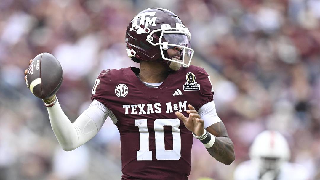 Dec 20, 2025; College Station, TX, USA; Texas A&M Aggies quarterback Marcel Reed (10) looks to pass during the first half of the first round game of the CFP National Playoff against the Miami Hurricanes at Kyle Field. Mandatory Credit: Maria Lysaker-Imagn Images