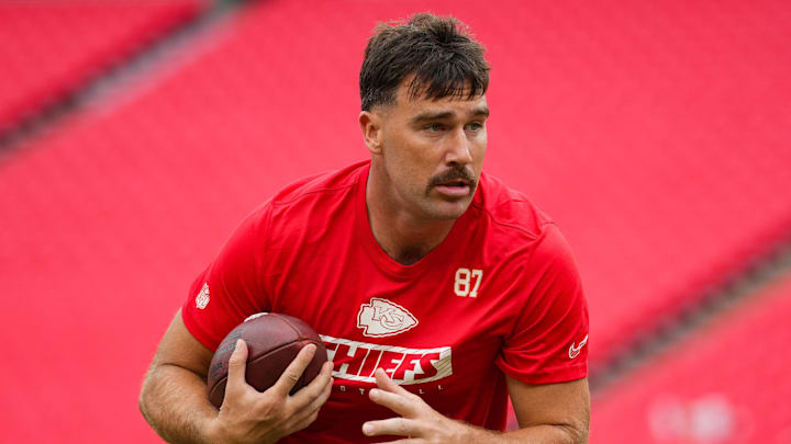 Aug 22, 2024; Kansas City, Missouri, USA; Kansas City Chiefs tight end Travis Kelce (87) warms up prior to a game against the Chicago Bears at GEHA Field at Arrowhead Stadium. Mandatory Credit: Jay Biggerstaff-Imagn Images