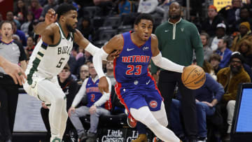 Jan 20, 2024; Detroit, Michigan, USA;  Detroit Pistons guard Jaden Ivey (23) dribbles on Milwaukee Bucks guard Malik Beasley (5): Rick Osentoski-USA TODAY Sports