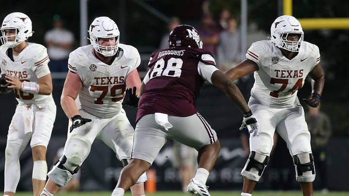 Oct 25, 2025; Starkville, Mississippi, USA; Texas Longhorns offensive linemen Connor Stroh (79) and Trevor Goosby (74) block Mississippi State Bulldogs defensive linemen Jamil Burroughs (88) during the fourth quarter at Davis Wade Stadium at Scott Field. Mandatory Credit: Petre Thomas-Imagn Images