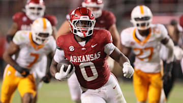 Oct 5, 2024; Fayetteville, Arkansas, USA; Arkansas Razorbacks running back Braylen Russell (0) rushes in the fourth quarter against the Tennessee Volunteers at Donald W. Reynolds Razorback Stadium. Arkansas won 19-14. Mandatory Credit: Nelson Chenault-Imagn Images
