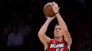Jan 21, 2025; Miami, Florida, USA; Miami Heat forward Duncan Robinson (55) shoots the basketball against the Portland Trail Blazers during the first quarter at Kaseya Center. Mandatory Credit: Sam Navarro-Imagn Images
