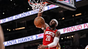 Oct 16, 2025; Atlanta, Georgia, USA; Houston Rockets forward Josh Okogie (20) dunks the ball against the Atlanta Hawks during the second half at State Farm Arena. Mandatory Credit: Dale Zanine-Imagn Images