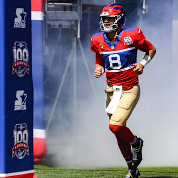 Sep 8, 2024; East Rutherford, New Jersey, USA; New York Giants quarterback Daniel Jones (8) enters the field during pregame introductions before a game against the Minnesota Vikings at MetLife Stadium. 