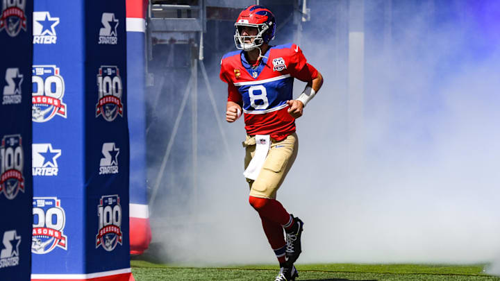 Sep 8, 2024; East Rutherford, New Jersey, USA; New York Giants quarterback Daniel Jones (8) enters the field during pregame introductions before a game against the Minnesota Vikings at MetLife Stadium. 