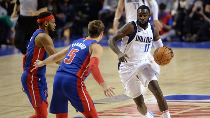 Dec 12, 2019; Mexico City, MEX; Dallas Mavericks guard Tim Hardaway Jr. (11) dribbles the ball while defended by Detroit Pistons guards Bruce Brown (left) and Luke Kennard (5) during the second half at Mexico City Arena. Mandatory Credit: Orlando Ramirez-USA TODAY Sports