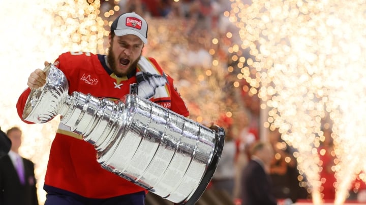 Jun 24, 2024; Sunrise, Florida, USA; Florida Panthers forward Aleksander Barkov (16) hoists the Stanley Cup  after defeating the Edmonton Oilers in game seven of the 2024 Stanley Cup Final at Amerant Bank Arena. Mandatory Credit: Sam Navarro-USA TODAY Sports