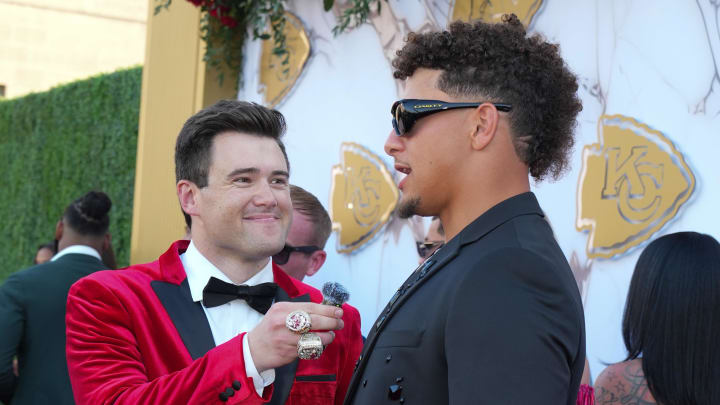 Jun 13, 2024; Kansas City, MO, USA; Kansas City Chiefs quarterback Patrick Mahomes (15) speaks to a staff member on the red carpet at the Nelson-Akins Museum of Art. Mandatory Credit: Denny Medley-USA TODAY Sports