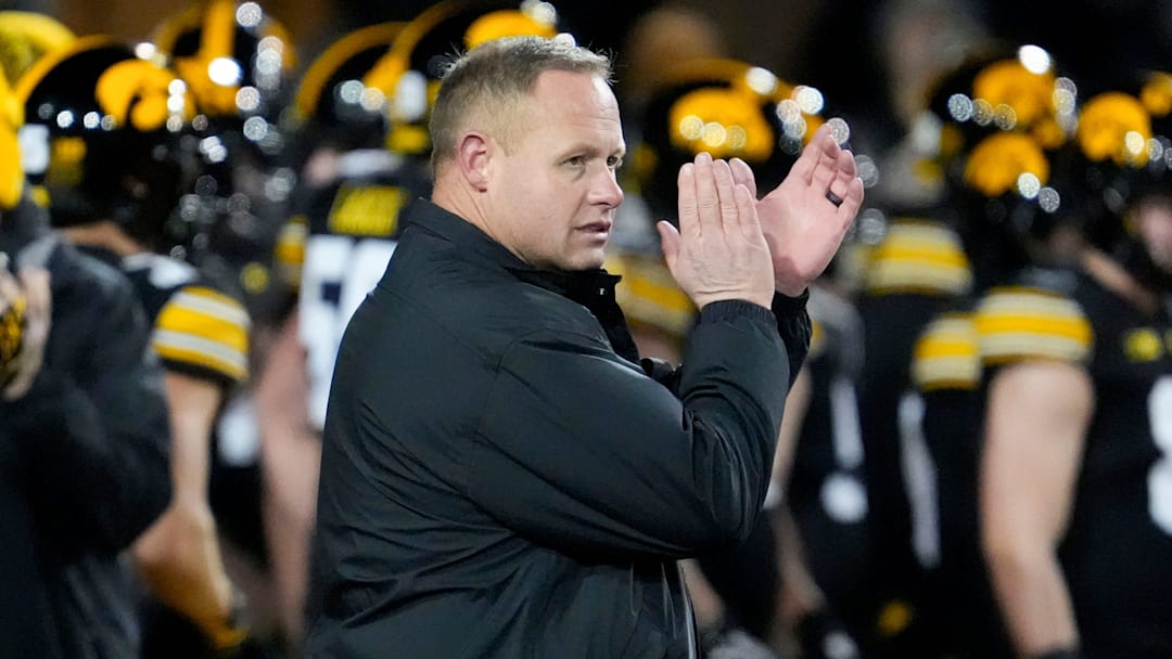 Iowa Hawkeyes assistant head coach Seth Wallace watches warmups before the football game against the Nebraska Cornhuskers Friday, Nov. 29, 2024 at Kinnick Stadium in Iowa City, Iowa.