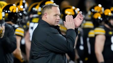 Iowa Hawkeyes assistant head coach Seth Wallace watches warmups before the football game against the Nebraska Cornhuskers Friday, Nov. 29, 2024 at Kinnick Stadium in Iowa City, Iowa.