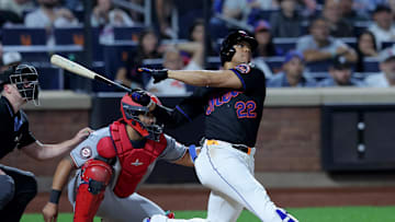 Sep 19, 2025; New York City, New York, USA; New York Mets right fielder Juan Soto (22) follows through on a three run home run against the Washington Nationals during the fourth inning at Citi Field. Mandatory Credit: Brad Penner-Imagn Images