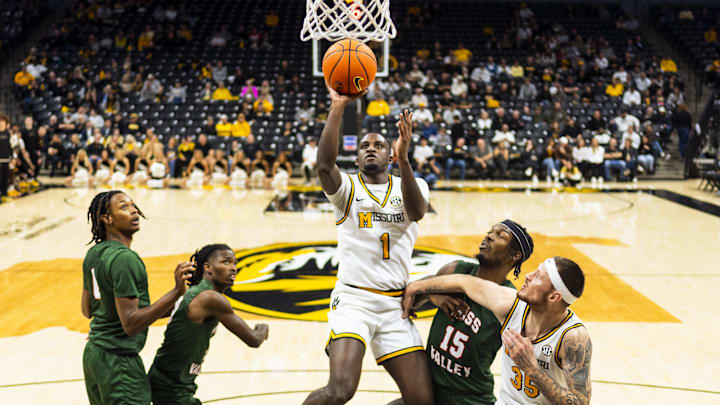 Nov 14, 2024; Columbia, Missouri, USA; Missouri Tigers guard Marques Warrick (1) shoots the ball during the first half against the Mississippi Valley State Delta Devils at Mizzou Arena. Mandatory Credit: Jay Biggerstaff-Imagn Images
