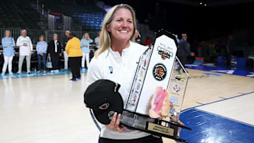 Nov 25, 2024; Paradise Island, Bahamas, BHS; North Carolina Tar Heels head coach Courtney Banghart celebrates with the Battle4Atlantis trophy after the game against the Indiana Hoosiers at the Atlantis Resort. Mandatory Credit: Kevin Jairaj-Imagn Images