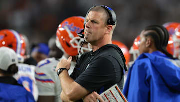 Sep 20, 2025; Miami Gardens, Florida, USA; Florida Gators head coach Billy Napier watches from the sideline against the Miami Hurricanes during the second quarter at Hard Rock Stadium. Mandatory Credit: Sam Navarro-Imagn Images