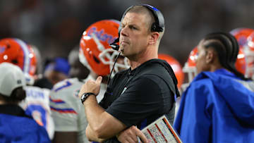 Sep 20, 2025; Miami Gardens, Florida, USA; Florida Gators head coach Billy Napier watches from the sideline against the Miami Hurricanes during the second quarter at Hard Rock Stadium. Mandatory Credit: Sam Navarro-Imagn Images