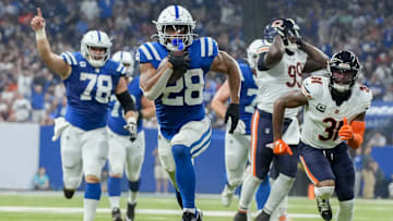 Indianapolis Colts running back Jonathan Taylor (28) rushes for a touchdown Sunday, Sept. 22, 2024, during a game against the Chicago Bears at Lucas Oil Stadium in Indianapolis.
