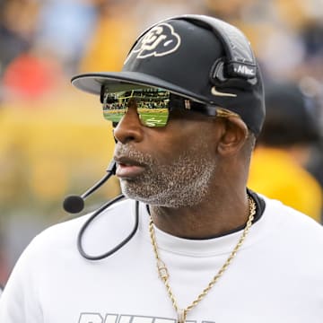 Nov 8, 2025; Morgantown, West Virginia, USA; Colorado Buffaloes head coach Deion Sanders walks along the sidelines late in the fourth quarter against the West Virginia Mountaineers at Milan Puskar Stadium. Mandatory Credit: Ben Queen-Imagn Images