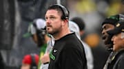 Nov 8, 2025; Iowa City, Iowa, USA; Oregon Ducks head coach Dan Lanning looks on during the first quarter against the Iowa Hawkeyes at Kinnick Stadium. Mandatory Credit: Jeffrey Becker-Imagn Images