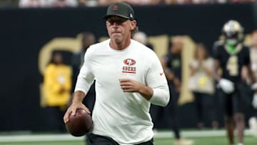 Sep 14, 2025; New Orleans, Louisiana, USA; San Francisco 49ers head coach Kyle Shanahan runs on the field before game against the New Orleans Saints at Caesars Superdome. Mandatory Credit: Matthew Hinton-Imagn Images