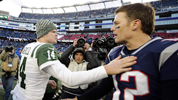 New England Patriots quarterback Tom Brady and New York Jets quarterback Sam Darnold congratulate each other.