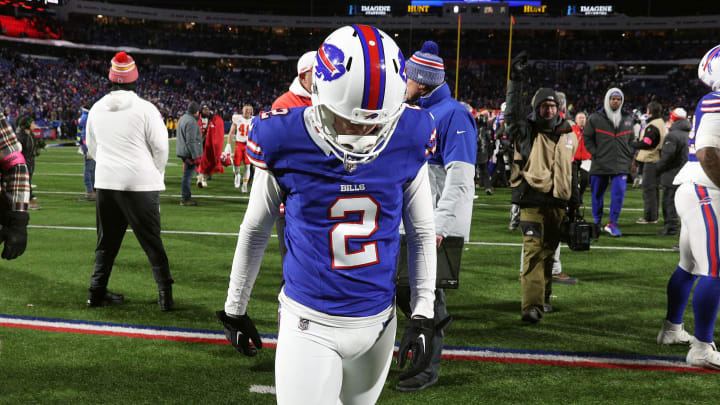 Buffalo Bills place kicker Tyler Bass (2) walks off the field after missing what would have been a game tying field goal in a 27-24 loss to the Chiefs in the divisional round.