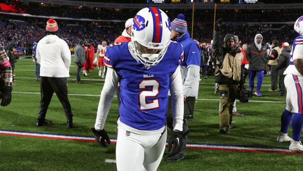 Buffalo Bills place kicker Tyler Bass (2) walks off the field after missing what would have been a game tying field goal in a 27-24 loss to the Chiefs in the divisional round.