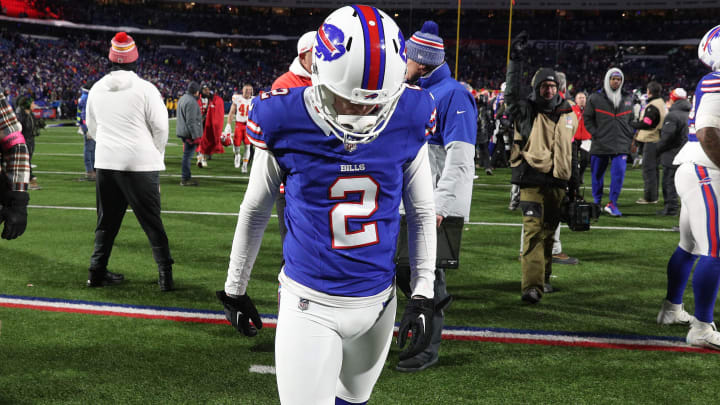 Buffalo Bills place kicker Tyler Bass (2) walks off the field after missing what would have been a