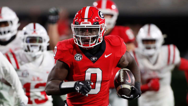 Georgia running back Roderick Robinson II (0) breaks away for a big gain during the second half of a NCAA college football game against Ole Miss in Athens, Ga., on Saturday, Nov. 11, 2023. Georgia won 52-17.