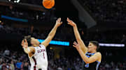 Mar 27, 2025; Newark, NJ, USA; Brigham Young Cougars guard Egor Demin (3) shoots the ball against Alabama Crimson Tide guard Mark Sears (1) during the first half during an East Regional semifinal of the 2025 NCAA tournament at Prudential Center. Mandatory Credit: Robert Deutsch-Imagn Images