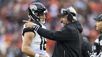 Dec 10, 2023; Cleveland, Ohio, USA; Jacksonville Jaguars head coach Doug Pederson talks with quarterback Trevor Lawrence (16) during the third quarter against the Cleveland Browns at Cleveland Browns Stadium. 