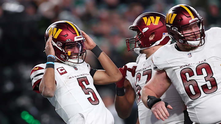 Washington Commanders quarterback Jayden Daniels celebrates after a play against the Philadelphia Eagles