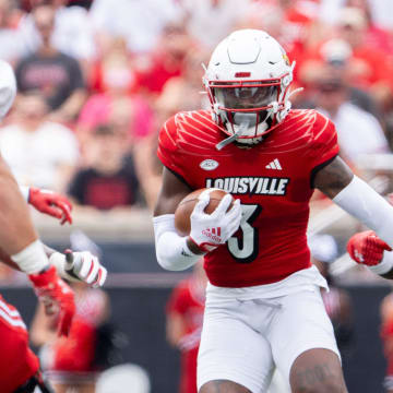 Louisville Cardinals defensive back Quincy Riley (3) runs the ball down the field during their game against the Austin Peay Governors on Saturday, Aug. 31, 2024 at L&N Federal Credit Union Stadium in Louisville, Ky.