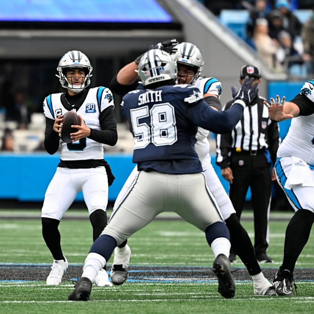 Carolina Panthers quarterback Bryce Younglooks to pass as Dallas Cowboys defensive tackle Mazi Smith pressures. Carolina Panthers quarterback Bryce Younglooks to pass as Dallas Cowboys defensive tackle Mazi Smith pressures.